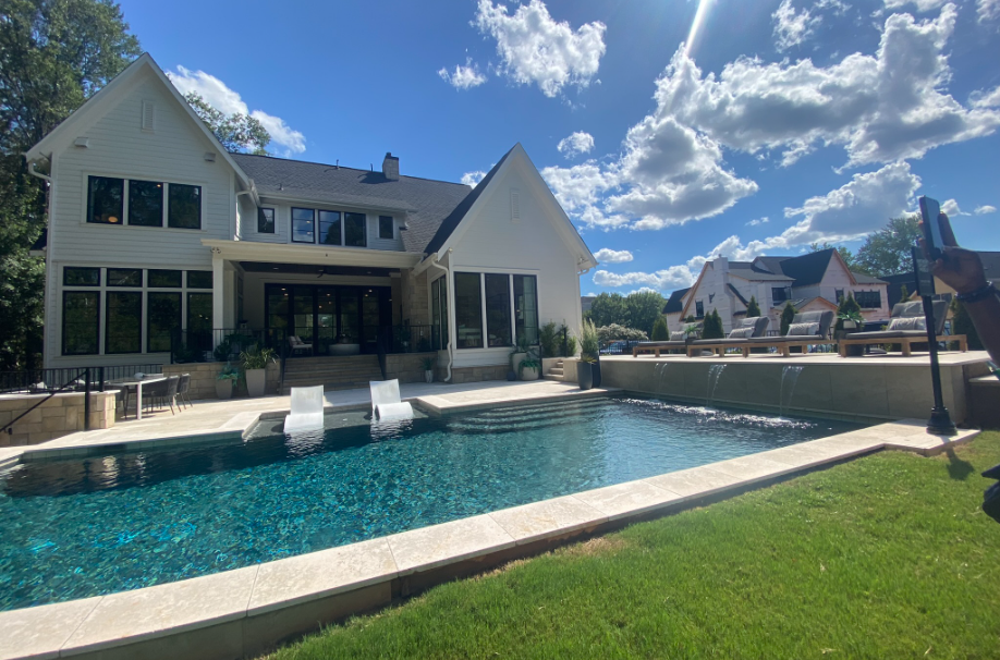 Charlotte home built by Copper Builders with a backyard pool.